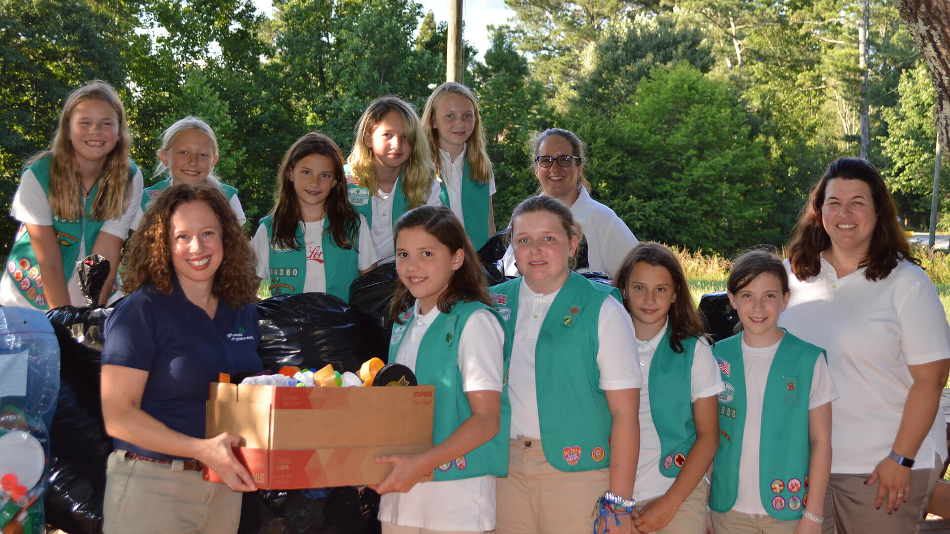 girl scouts delivering cookies